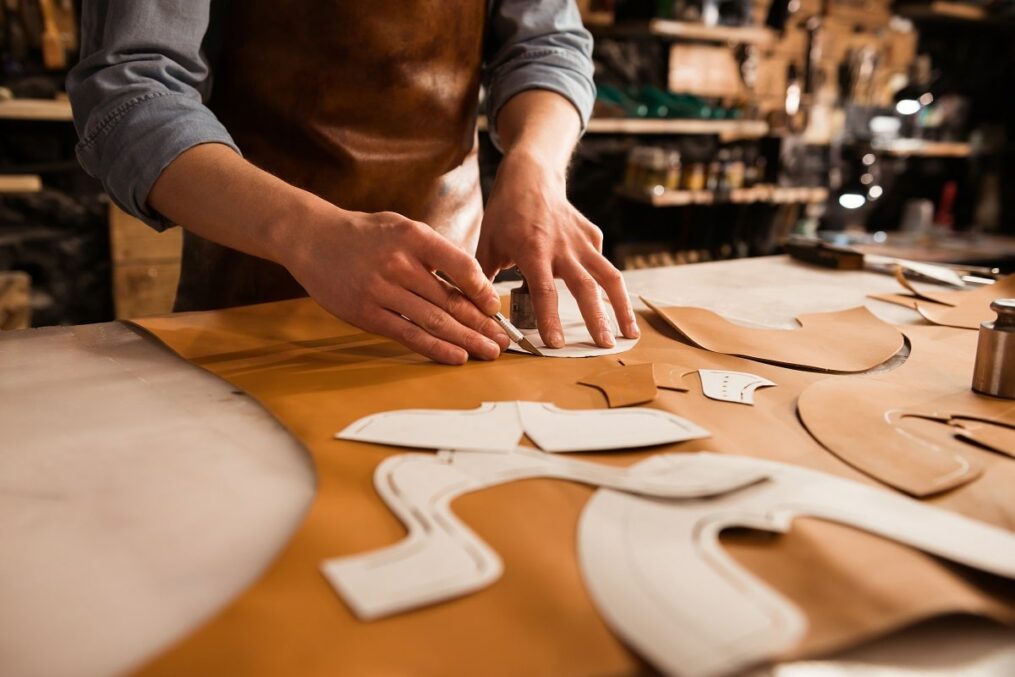 Man working on a shoe pattern